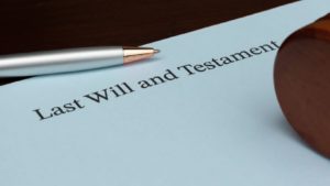 Last Will and Testament document with a pen and gavel, representing estate planning, legal documents, and wills.